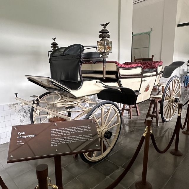 A museum filled with coaches on exhibits