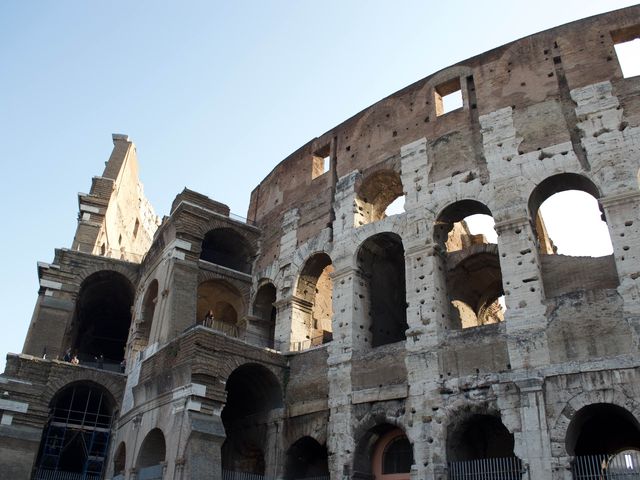 Walking in Rome by the Colosseum 
