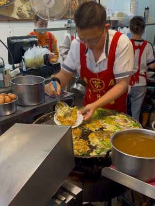 Oyster Egg Omelette on Conveyor Belt: Michelin Dish at Ningxia Night Market