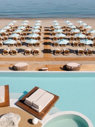 A private pool and slow life strolling through the ancient town at the divine resort on Crete, Greece