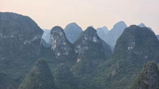 Ready for a jaw-dropping nature fix? 🌄 Yangshuo delivers, with the epic Laozhai Mountain Park in Xingping—where the Karst mountain views are next-level and your camera roll will thank you!

Top Spot to Visit:
Laozhai Mountain Park (Xingpingzhen, Yangshuo, Guilin, Guangxi, China) is open year-round, all day. It’s totally free—no tickets, no hassle! The hike isn’t super easy, but it’s 100% worth it for those unreal panoramas of the Karst peaks and winding Li River. Take your time hiking up, and try sunrise or sunset for the ultimate Instagram moment.

Practical Tips:
Trust me: skip the paid viewpoints and head straight here. Wear sturdy shoes, bring water (none sold at the top!), and pack light—those stairs get steep. If you’re looking to avoid crowds, go early morning.

How to Get Around:
Hop on a local bus or rent a bike from Yangshuo town to Xingping. The park entrance is easy to spot in Xingping village.

Food Recommendations:
Grab a bowl of Guilin rice noodles at a Xingping local café after your climb—they’re cheap, delicious, and perfect for refueling.

Destination Tips:
Yangshuo is usually humid and warm; lightweight clothing and bug spray are a must. No visa needed for most major countries if you’re just visiting China for tourism, but check official rules to be sure. ATMs work, but bring cash for rural spots.

#YangshuoViews  #ChinaTravel  #KarstMountains  #BudgetAdventure 