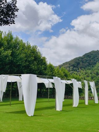 Why choose Naked Stables Moganshan for high-end corporate meetings?