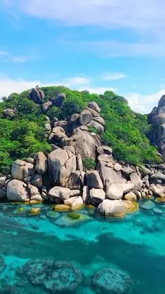 Nature's Masterpiece: Surrender to the Untamed Splendor of Freedom Beach, Koh Tao's Hidden Gem of Rocks, Palms, and Azure Waters