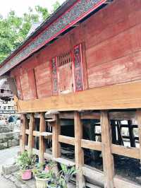 Standing Among the Ancestral Batak Houses of Huta Siallagan
