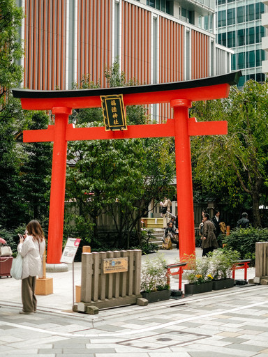 Amidst Tokyo's modern skyline suddenly, a red gate appears