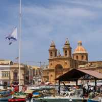 🚗🌊 Ride Sharing Travel in Marsaxlokk: Budget-Friendly Vibes in Malta’s Fishing Gem