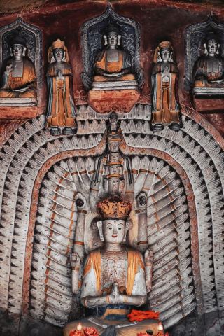 Drive 1 hour from Leshan to see exquisite Ming Dynasty stone carvings in Jiajiang. 