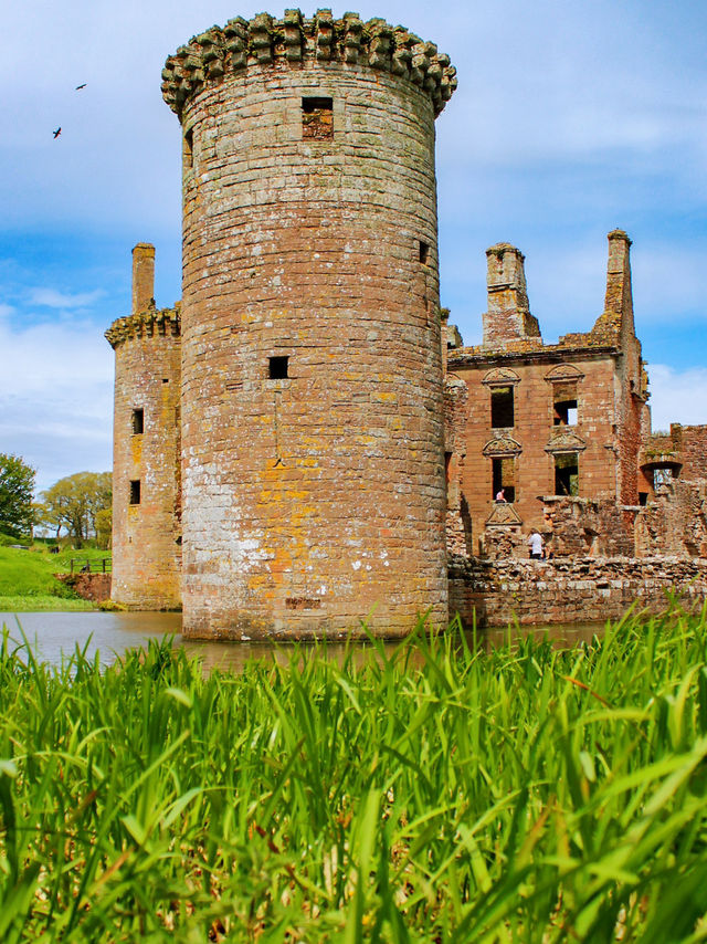 Spring Serenity: Relaxing on the Meadow at Caerlaverock Castle