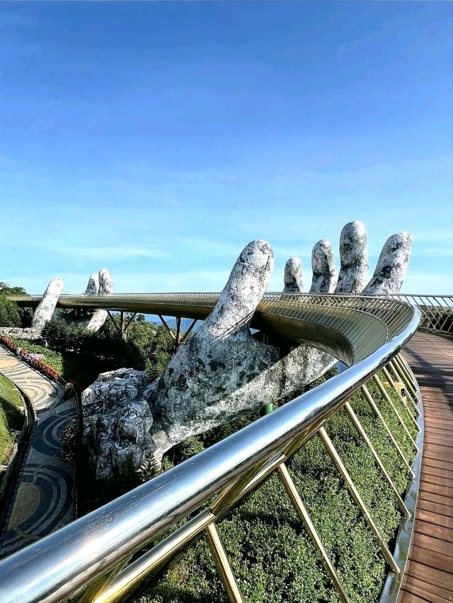 Walking Above the Clouds at Golden Hans Bridge at Ba Na Hills, Vietnam