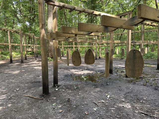 Art sculptures lost in a forest