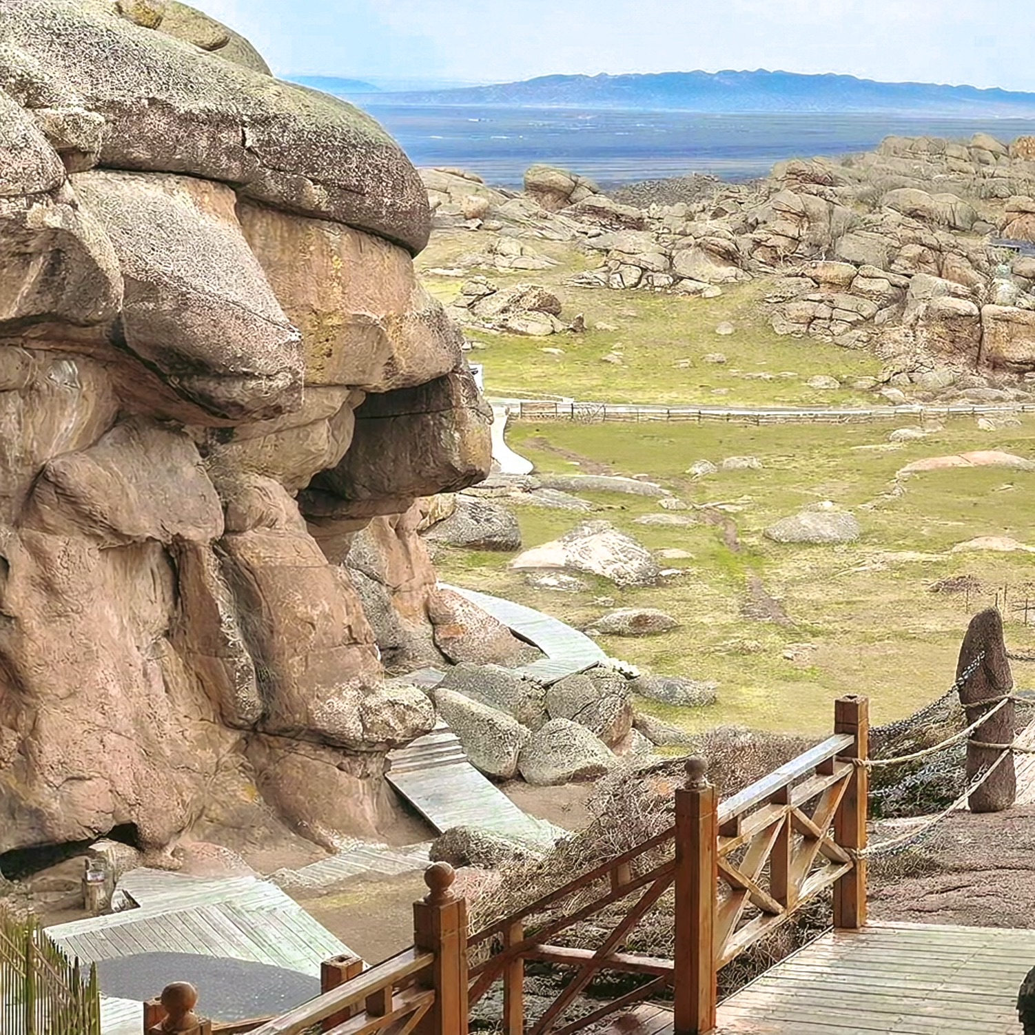 My Most Underrated Xinjiang Find: Magical Grassland Stone City 🌿

If you love hunting for hidden gems away from tourist crowds, Grassland Stone City in Xinjiang is hands down my favorite #underratedspots of this trip. Most travelers rush to popular Xinjiang scenic spots and completely overlook this magical land, but it turned out to be my most surprising and peaceful travel discovery.

I visited this secret granite wonderland during my northern Xinjiang road trip. Unlike crowded classic attractions, this vast stone city is incredibly quiet and rarely packed. I even had huge sections of the scenic area almost all to myself, which felt like exclusive access to a private natural museum.

Shaped by millions of years of wind erosion and natural weathering, the landscape here is absolutely one-of-a-kind. Countless bizarre giant rock formations scatter across the rolling grassland hills. These natural stone sculptures look vividly lifelike. Some resemble sleeping dragons and ancient turtles, while others look like wild animals and human figures. Every turn brings a new unique stone shape, making hiking here endlessly fun and full of imagination.

What makes this spot extra special is its perfect mix of wild grassland and mystical stone scenery. Soft green meadows, scattered wild flowers, and grazing cattle surround rugged ancient rocks. The ancient Tongtian Cave hidden in the stones adds a touch of historic charm, blending natural beauty with primitive cultural traces. Standing on the wooden trail overlooking the endless stone forest under the clear blue sky, I felt totally immersed in pure, untouched wilderness.

The best part about this underrated spot is its original, uncommercialized vibe. There are no noisy stalls, overpriced shops, or massive tourist groups. You can walk slowly, take photos freely, and enjoy the serene wind and stunning views at your own pace. It offers a peaceful healing experience that busy famous scenic spots can never match.

Grassland Stone City proves that the most breathtaking travel views are often hidden in lesser-known corners. It’s a raw, beautiful, and totally underrated paradise worth adding to every traveler’s bucket list.

Let’s chat! Do you prefer crowded popular landmarks or quiet underrated hidden spots? Have you ever stumbled on a stunning unknown natural scenery during your road trip? Share your best underrated travel finds below!

 #underratedspots 