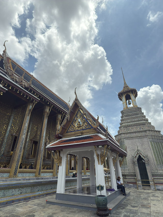 Sacred Serenity Amidst Thai Grandeur, A Spiritual Pause at Wat Phra Kaew