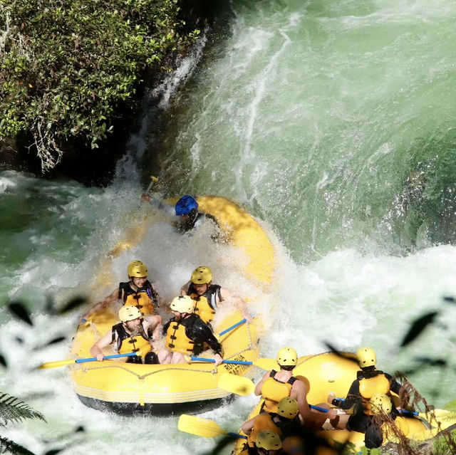 Rotorua Rafting with Coach and partners.