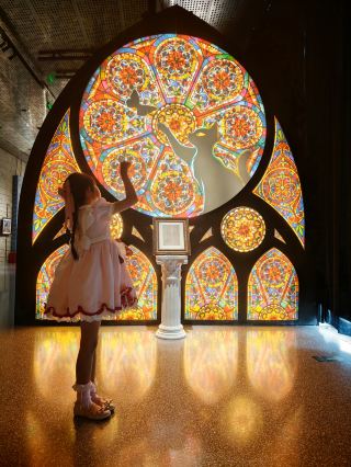 Taking kids to an art exhibition | We stumbled into the "civilized universe" of cats.
