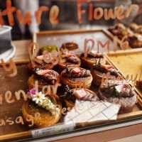 "Afternoon Tea Experience in Melaka: Delightful Butter Pastry and Aromatic Flower Tea"