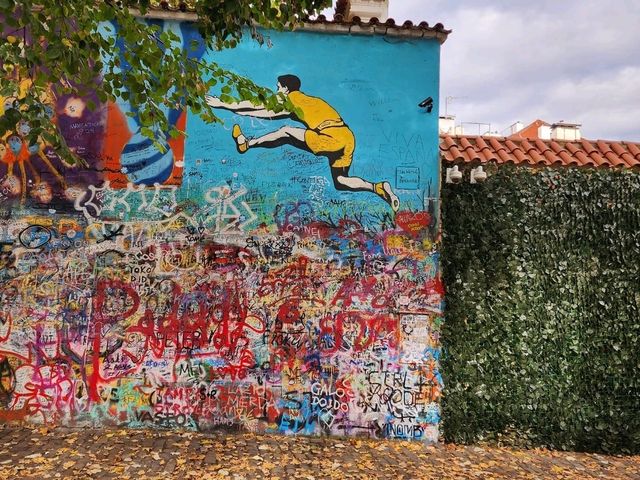 Colorful Vibes at Prague’s Iconic Lennon Wall 🎨✨ Colorful Vibes at Prague’s Iconic Lennon Wall 🎨✨