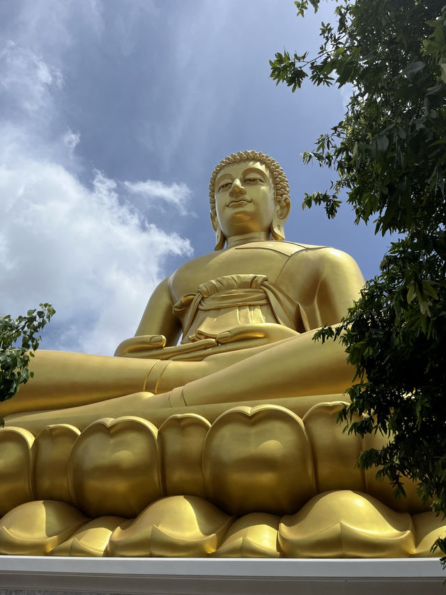 Gigantic Golden Buddha and Ethereal Glass Stupa