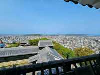 Title: Matsuyama Castle – A Timeless Sentinel Overlooking Ehime