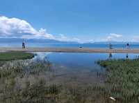 Lake Sayram: Twin Mirrors of Sky and Water