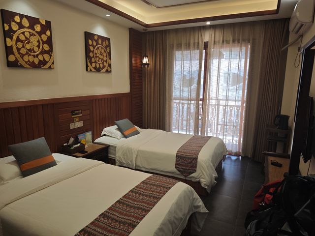 去西雙版納就住告莊