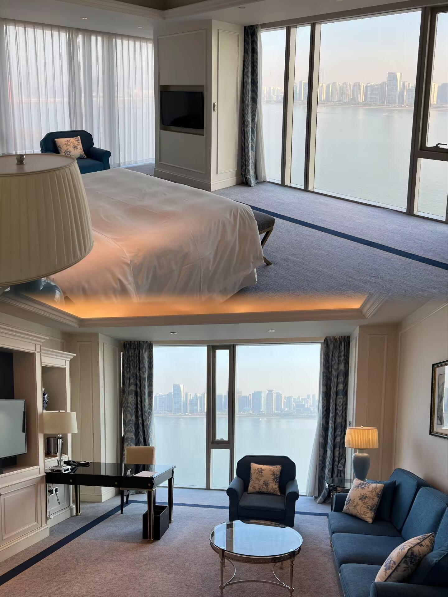 Hangzhou Zunlan Qianjiang Luxury Collection Hotel

If you want to stay comfortably and stylishly in Hangzhou, this hotel is definitely worth adding to your favorites. It’s located right in the core area of Qianjiang New City, just a few minutes’ walk from the Qiantang River, making it super convenient to watch the light show at night. The Metro Line 4 Civic Center Station is about a 7-8 minute walk away. It takes around 20 minutes by taxi to West Lake Scenic Area and about half an hour to the East Railway Station, making it very convenient for both business trips and tourism.

Hotel Tips

It’s recommended to book about two weeks in advance, as prices fluctuate noticeably on weekends and holidays. River view rooms are a bit more expensive than standard rooms but the experience is truly different. Check-in time is generally 2 PM; if you arrive early, you can store your luggage and explore the nearby area first. Right next to the hotel are MixC and Raffles City, so dining and shopping are very convenient with many options within a 10-minute walk. Breakfast is served on the second floor in the all-day dining restaurant, offering both Chinese and Western options. Hangzhou specialties like Pian’er Chuan (sliced fish soup) and Xiaolongbao (soup dumplings) taste great. It’s best to go before 9:30 AM because some hot dishes are removed later. The gym and pool are on the upper floors; the pool is heated with floor-to-ceiling windows facing the river view. It’s less crowded in the morning or evening. Parking is free; if you drive, just park on B2 level and take the elevator straight up to the lobby.

Stay Experience

The lobby is on a high floor, and when the elevator doors open, you’re greeted by a full wall of floor-to-ceiling windows with direct views of the Qiantang River and city skyline—truly impressive. The rooms are quite spacious, with even the basic rooms around 50 square meters. The bathroom has a good dry-wet separation, and the bathtub faces the river, perfect for a relaxing soak while enjoying the night view. The bedding is on the softer side, and you can choose between down and latex pillows, which is very thoughtful. The minibar is complimentary on the first round, stocked with Coke, Sprite, Perrier, and more, and can be replenished after consumption.

Service is responsive; whether you request something or ask about sightseeing routes, someone usually responds within 10 minutes. Turndown service includes small snacks and fruit. Although not extravagant, the attention to detail is appreciated.

Highlights

The standout features of this hotel are the high-altitude river views and the design aesthetic. The hotel’s overall blue and gold color scheme follows a light luxury style, with many artistic installations in the corridors and public areas, making it very photogenic. The executive lounge on the top floor offers even more spectacular views, with quality afternoon tea and Happy Hour offerings. Sitting there to watch the sunset in the evening is very relaxing. If you’re staying for an anniversary or birthday, inform the front desk in advance; they usually do a simple room decoration to enhance the atmosphere.

Overall, this hotel is the kind you won’t regret staying at. The location, views, and service are all excellent, making it suitable for couples, business travelers, or family visits with parents. If your budget allows, go straight for the river view room—definitely money well spent.