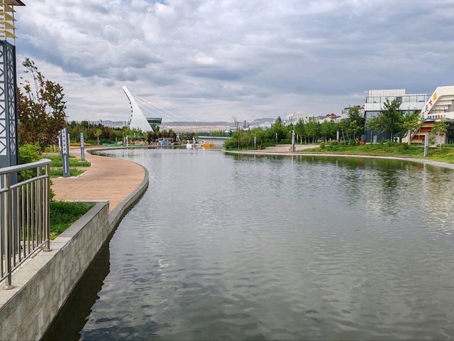 Small Park by Nightlight Town Hotel: A City Oasis by the Internet-Famous Bridge