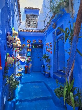 Chefchaouen, Morocco’s Blue City, is famous for its blue-painted streets and peaceful mountain setting. Top attractions include the Kasbah Museum, located in a restored fortress with beautiful gardens and city views, and the Grand Mosque, known for its unique octagonal minaret. Don’t miss Ras El Maa waterfall, a serene spot where locals gather to relax. The medina is perfect for exploring artisan shops, local crafts, and enjoying traditional Moroccan food. Chefchaouen blends color, culture, and calm in a unique way.