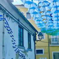 🌈 Umbrella Skies & Hidden Charms: A Colorful Day in Águeda