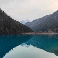 Sapphire Reflections of the icy mountain: The Enchanting Tiger Lake and Five Flower Lake