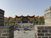 Stylish curvy Chinese museum about canal