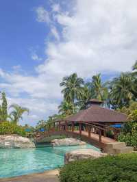 rainforest setting, over-water chalets, private beach, and friendly service