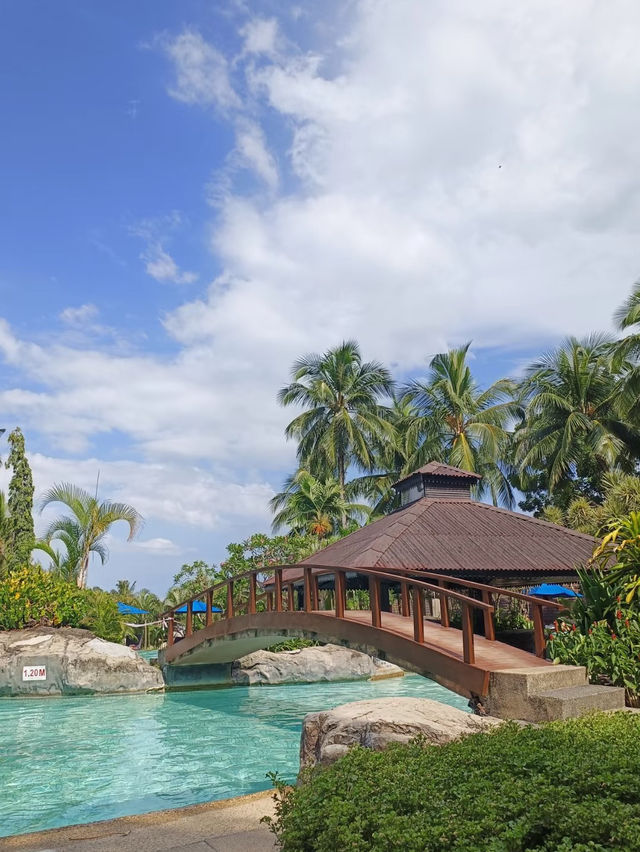rainforest setting, over-water chalets, private beach, and friendly service