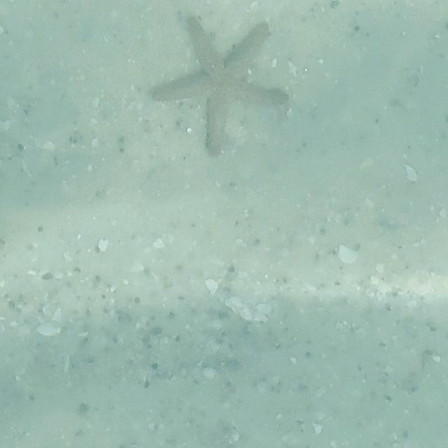 Crystal clear water and super soft sand 