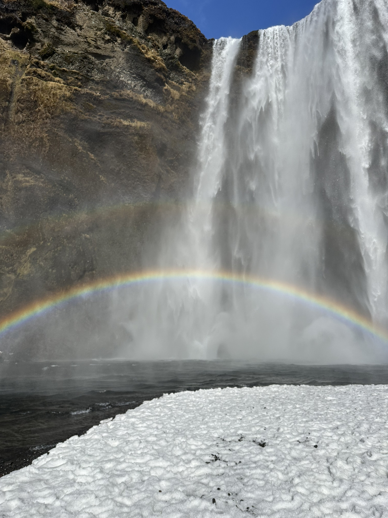 Spectacular Waterfall and Rainbow: A Must-Visit Attraction in Iceland.
