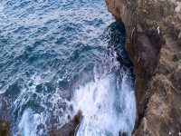 Statue, Sea, and Serenity – A Hidden Gem by the Rocks