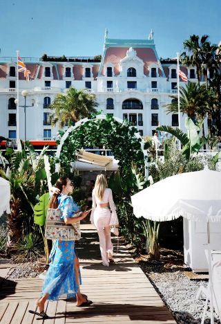 Saint-Tropez laid-back guide | sun umbrella + yacht + Côte d'Azur blue