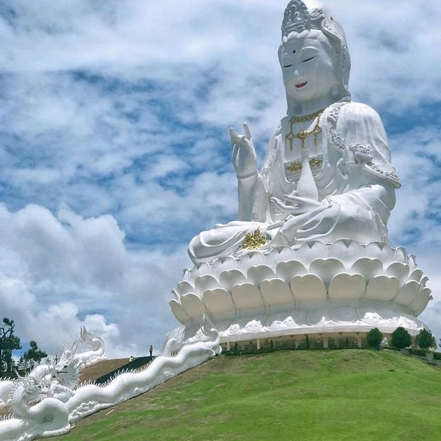 Amazing white Buddha statue with snake 
