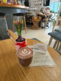 Relaxing at a Greenery Cafe with Furry Friends