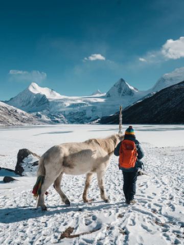 Snow peaks like golden pyramids, the "Eden" deep in the world