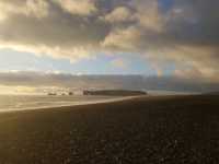 Unveiled Reynisfjara's Basalt Beauty and Sunset Dreams