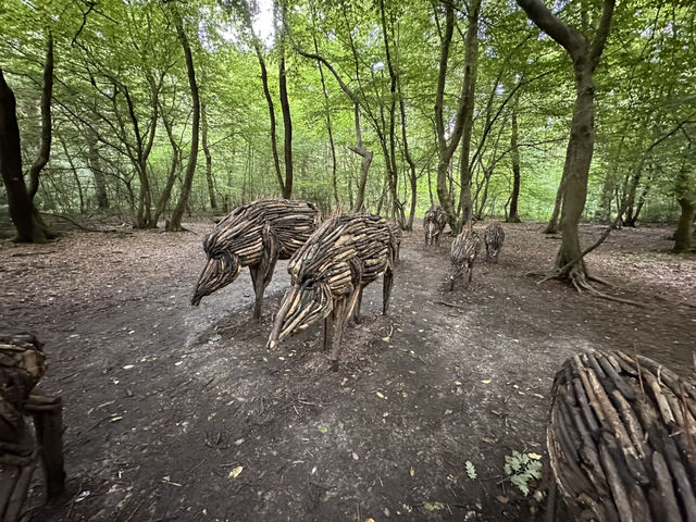 Art sculptures lost in a forest