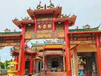 Whimsical Wonders: Discover the Majestic Dragon Sculpture at 8 Chinese Temple Village