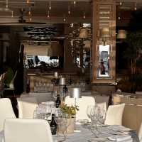 Upscale dining paired by a port view!