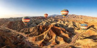 Get the ultimate guide to the stunning sunset at Rainbow Danxia with one click!