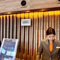 "Infinity Pool at Courtyard by Marriott Shatin: A Panoramic Oasis"