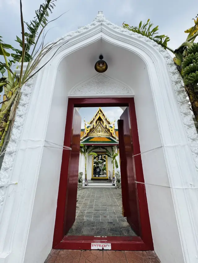 Visit Wat Suthat in the heart of Bangkok