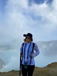The Turquoise Crater Lake Above the Clouds