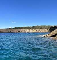 Paradise Found: A Journey to Cala Bassa’s Pristine Blue Waters