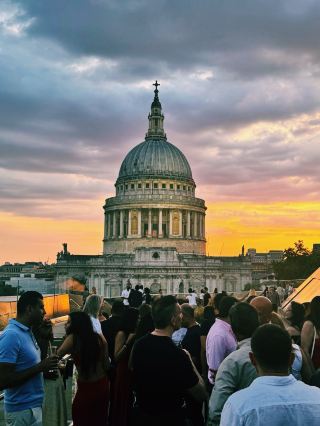 London’s Luxury Rooftop View? Sunset at Madison by St Paul’s ✨

📍 Madison Rooftop, One New Change, London

If you want one of the best sunset views of St Paul’s Cathedral, save Madison rooftop at One New Change. The terrace gives you a dramatic close-up view of the dome, golden-hour skies, the City skyline and that “London rooftop moment” that feels much more expensive than it is.

This is a brilliant photo spot because the view changes so quickly. One minute St Paul’s is glowing in soft evening light, then the sky turns orange, pink and blue as the city lights start to come on. It’s especially beautiful in summer when the evenings are longer and you can enjoy the rooftop atmosphere before or after drinks.

📸 Best photo opportunity: arrive before sunset and take your first shots while the sky still has colour. Use St Paul’s as the main subject, then capture the rooftop planting, glass edges, skyline, people relaxing on the terrace and the golden reflection on the walkways. It makes the carousel feel like a full rooftop experience, not just one cathedral photo.

🍸 Drinks tip: Madison is perfect if you want cocktails, wine or a rooftop drink with a view. It can get busy around sunset, so arrive early if you want the best spot, especially on warm evenings.

🍽️ Nearby food and drink: stay at Madison for drinks or dining, explore One New Change for more restaurants, or walk toward Paternoster Square, St Paul’s Churchyard, Blackfriars, Bank or the Thames for pubs, cafés and dinner options.

🎟️ Nearby things to do: visit St Paul’s Cathedral, walk across Millennium Bridge to Tate Modern, explore the Thames Path, stop by Paternoster Square, visit One New Change rooftop, or continue toward South Bank for more evening views.

💡 Pro Tip: Don’t leave immediately after sunset. Stay for blue hour when the dome darkens, the sky still has colour and the city lights start to glow. That’s often when the best rooftop photos happen.

#madisonlondon #onenewchange #stpaulscathedral #londonrooftop #londonsunset #freelondonviews #visitlondon #londonphotography #londonviews #cityoflondon #rooftopbarlondon #goldenhourlondon #londontips #tripmoments #wanderlustuk
