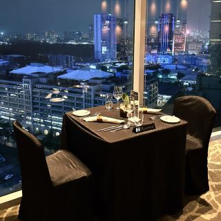 Enjoy a glass of wine on the 22nd floor at 22 Prime Lounge